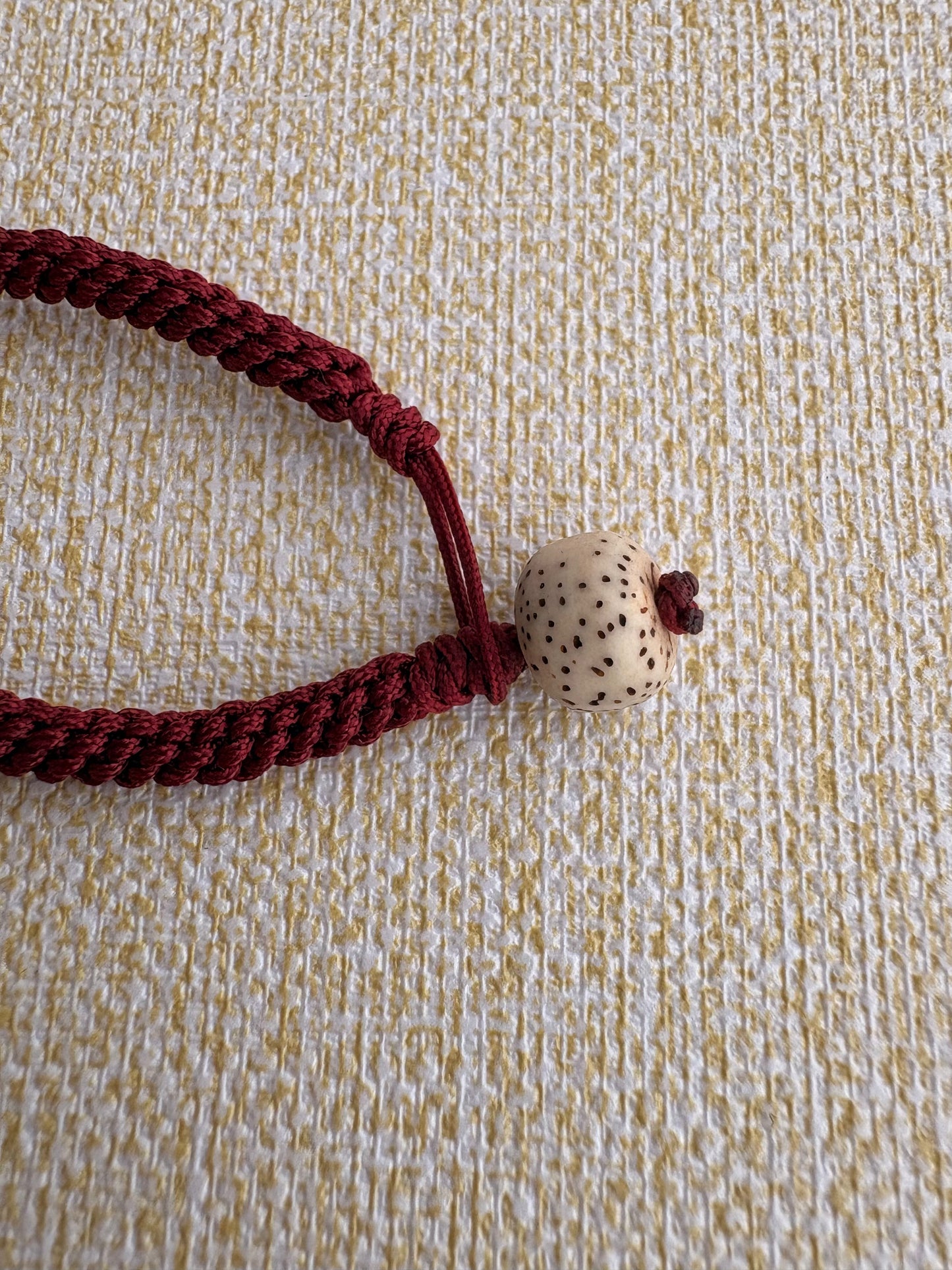 Small Mahakala Thangka Charm with Prayer Wheel Tassel in Tibetan Purple