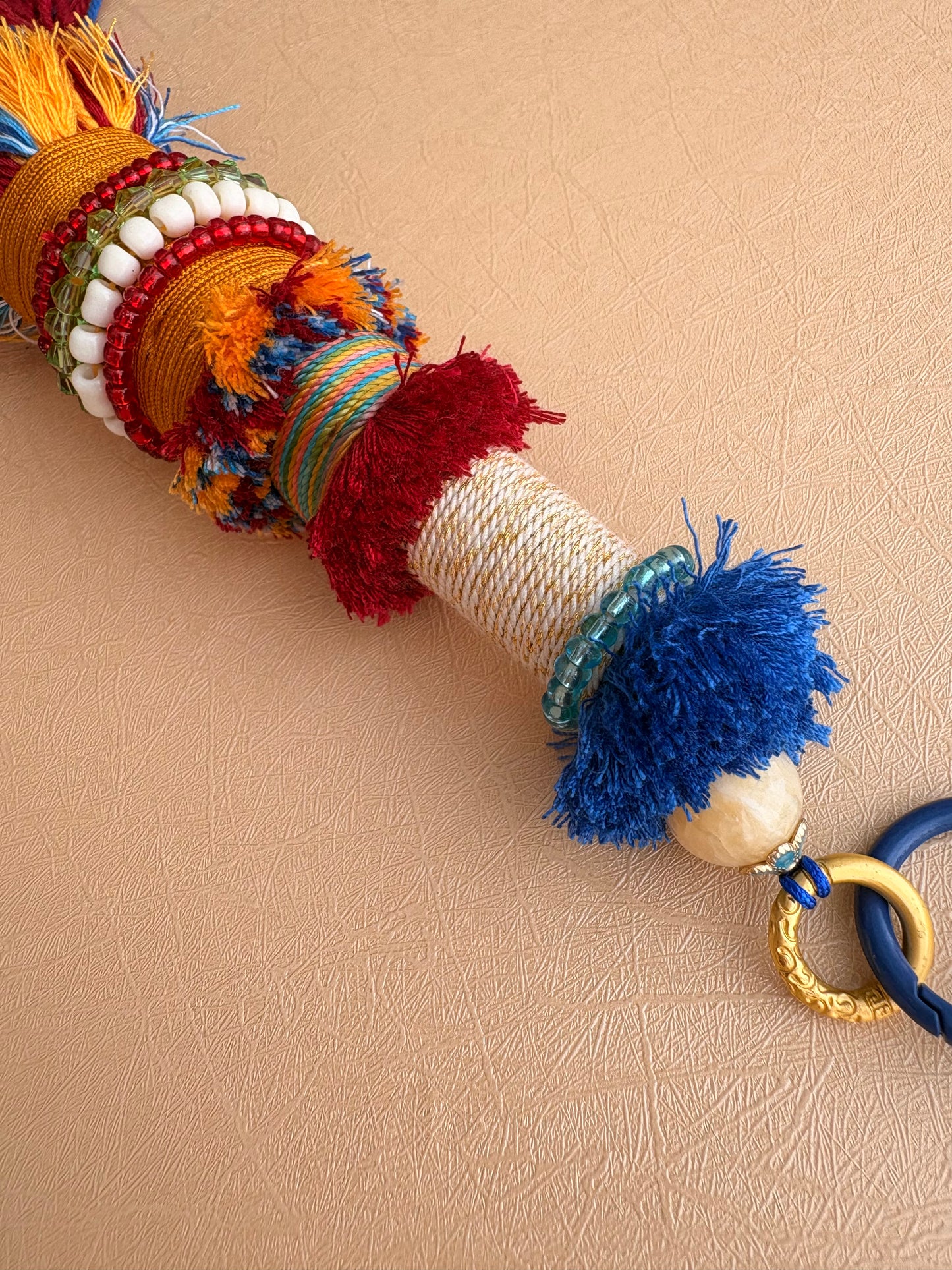 Victory Banner Charm with Black Jambhala Thangka Tassel in Tibetan Red and Blue