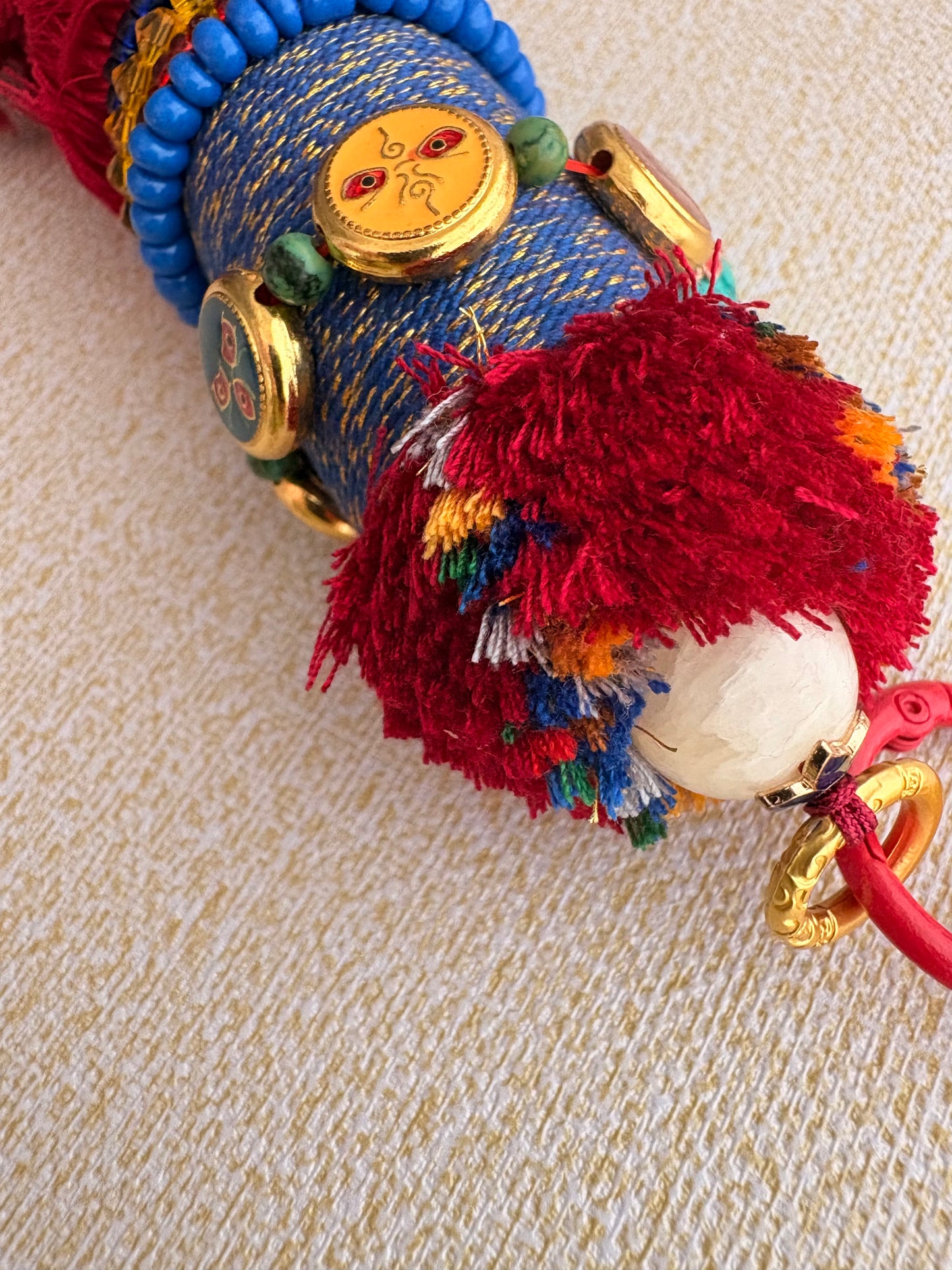 Victory Banner Charm with Nine-Eyed Dzi Bead Tassel in Tibetan Red and blue