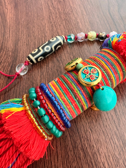 Victory Banner Charm with Nine-Eyed Dzi Bead Tassel in Tibetan Red
