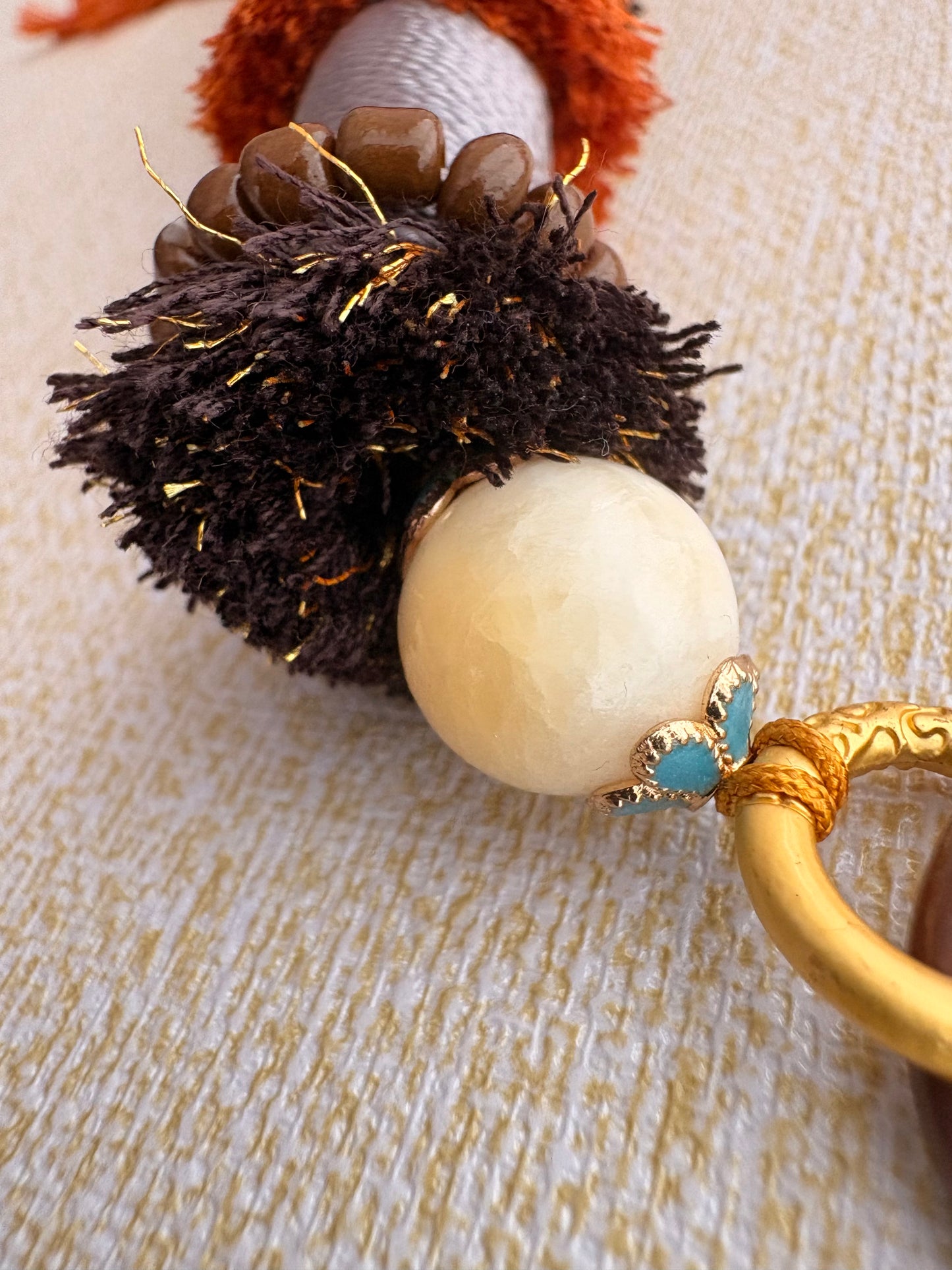 Victory Banner Charm with Sakyamuni Buddha Thangka Tassel in Tibetan Brown