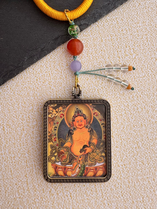 Yellow Jambhala Thangka Charm with Prayer Wheel Tassel in Tibetan Golden Yellow