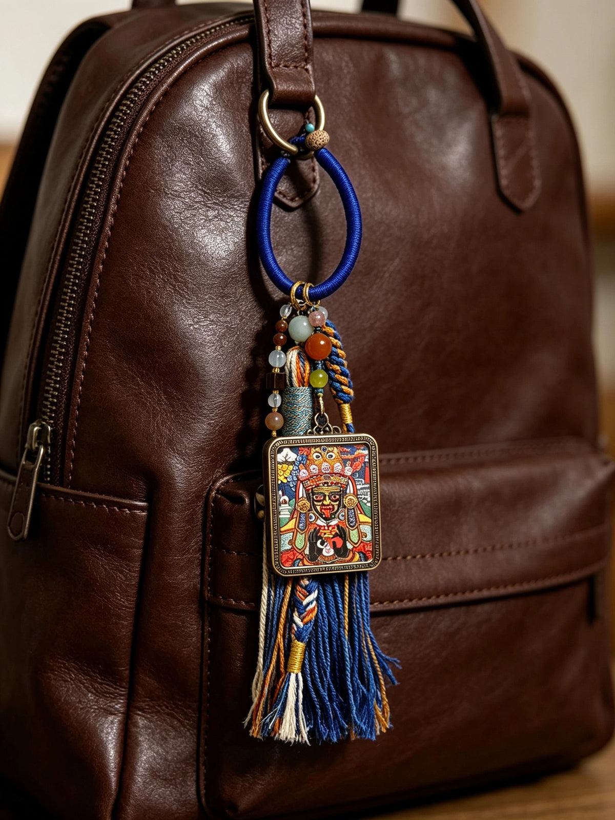 Zaki Lhamo Thangka Charm with Three-Eyed Dzi Bead Tassel in Deep Tibetan Blue