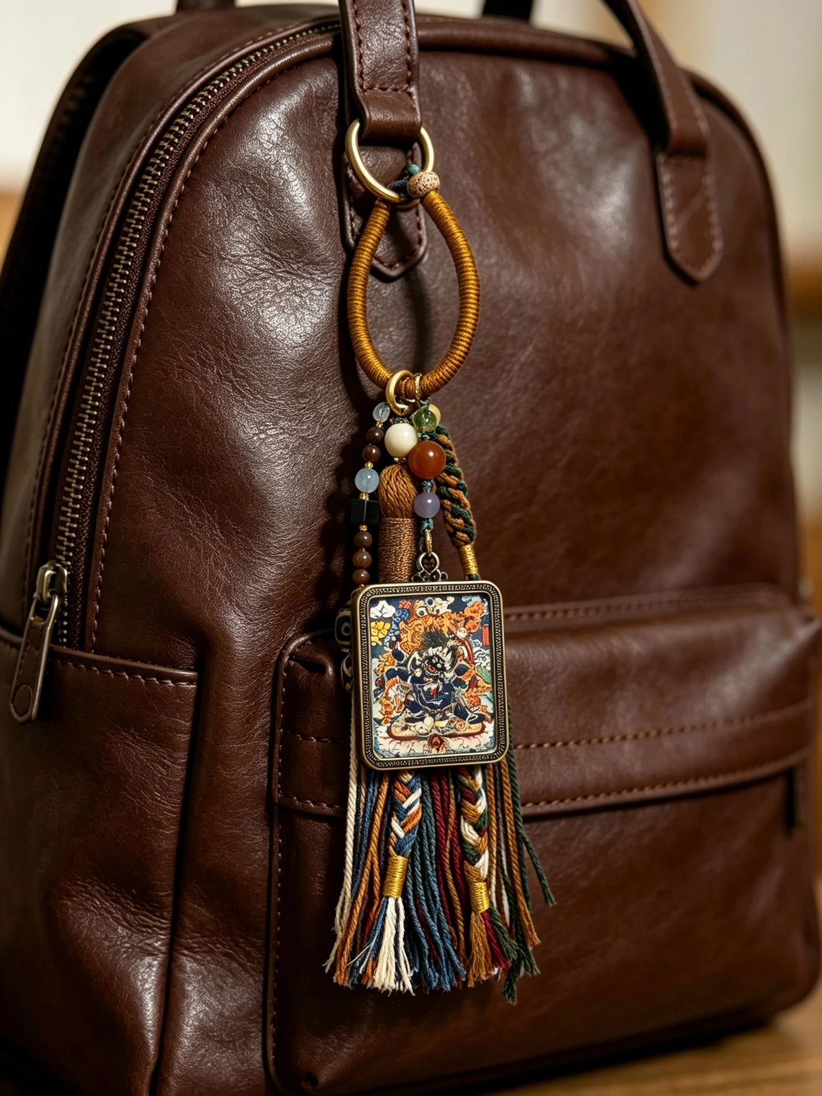 Mahakala Thangka Charm with Three-Eyed Agate Dzi Bead Tassel in Tibetan Brown