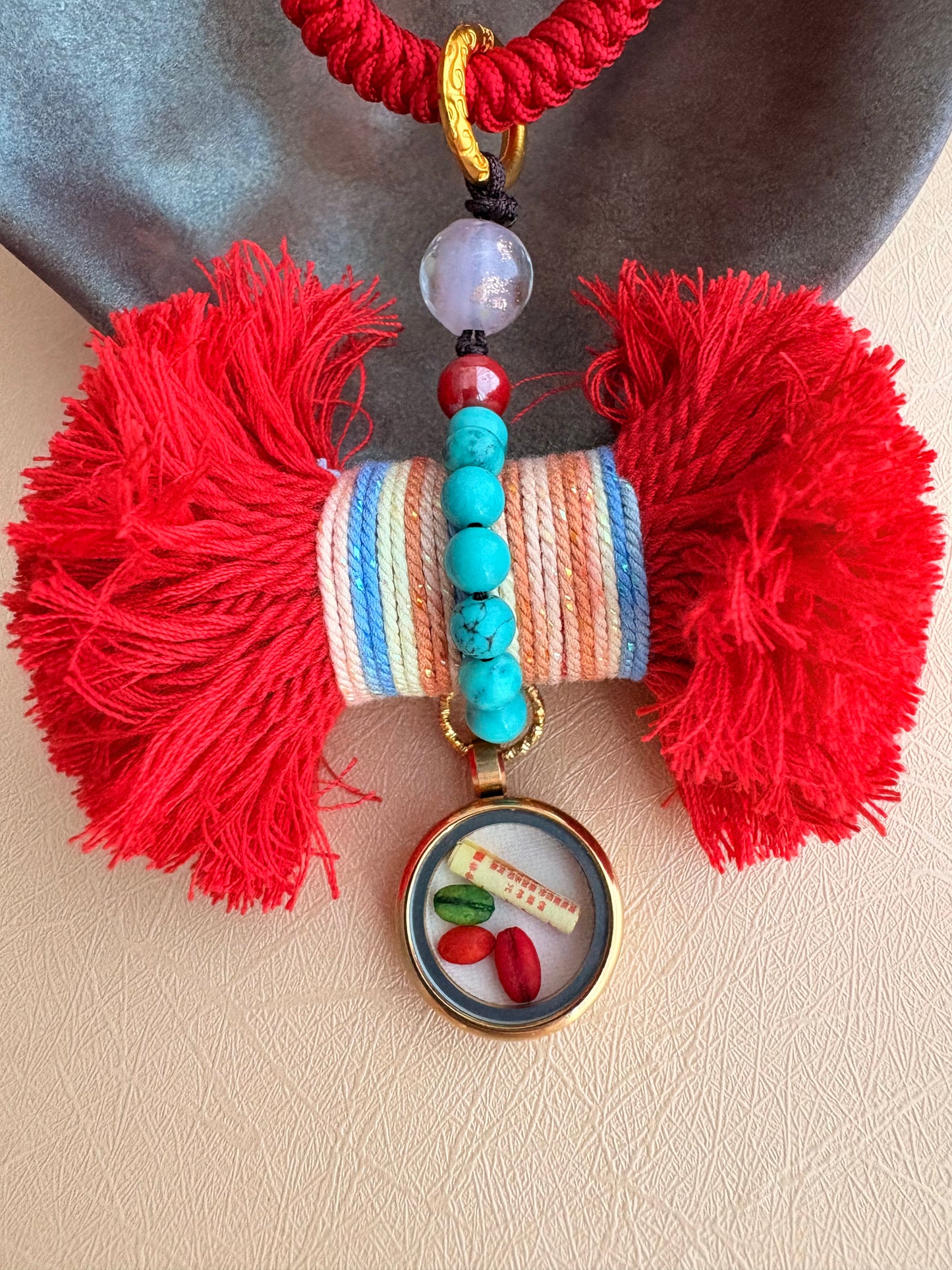 Damaru Charm with Red Jambhala in Tibetan Red