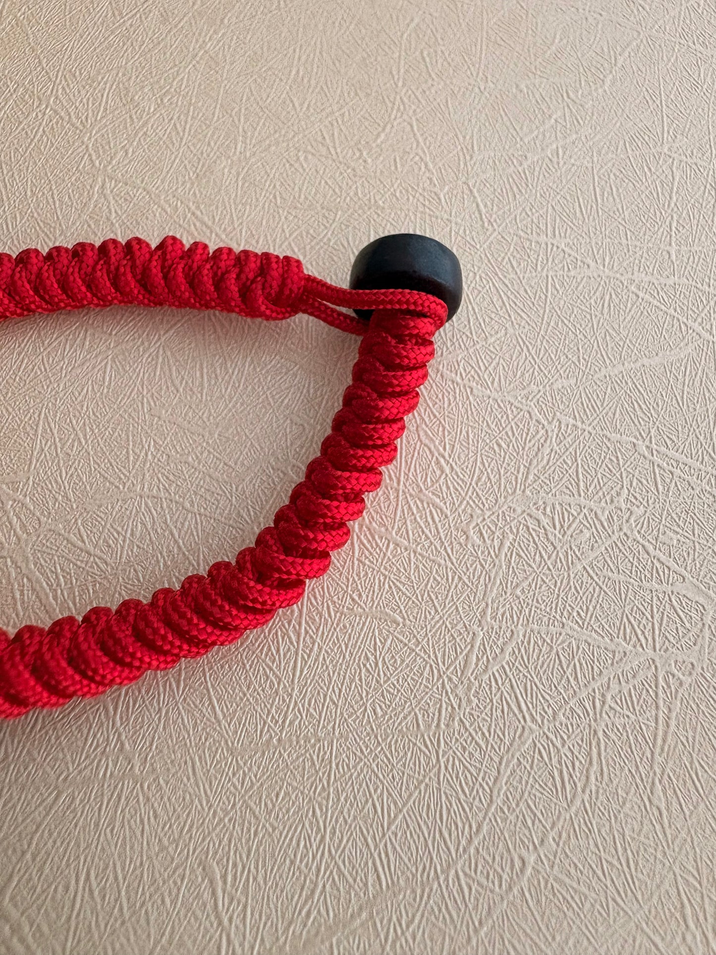 Damaru Charm with Red Jambhala in Tibetan Red