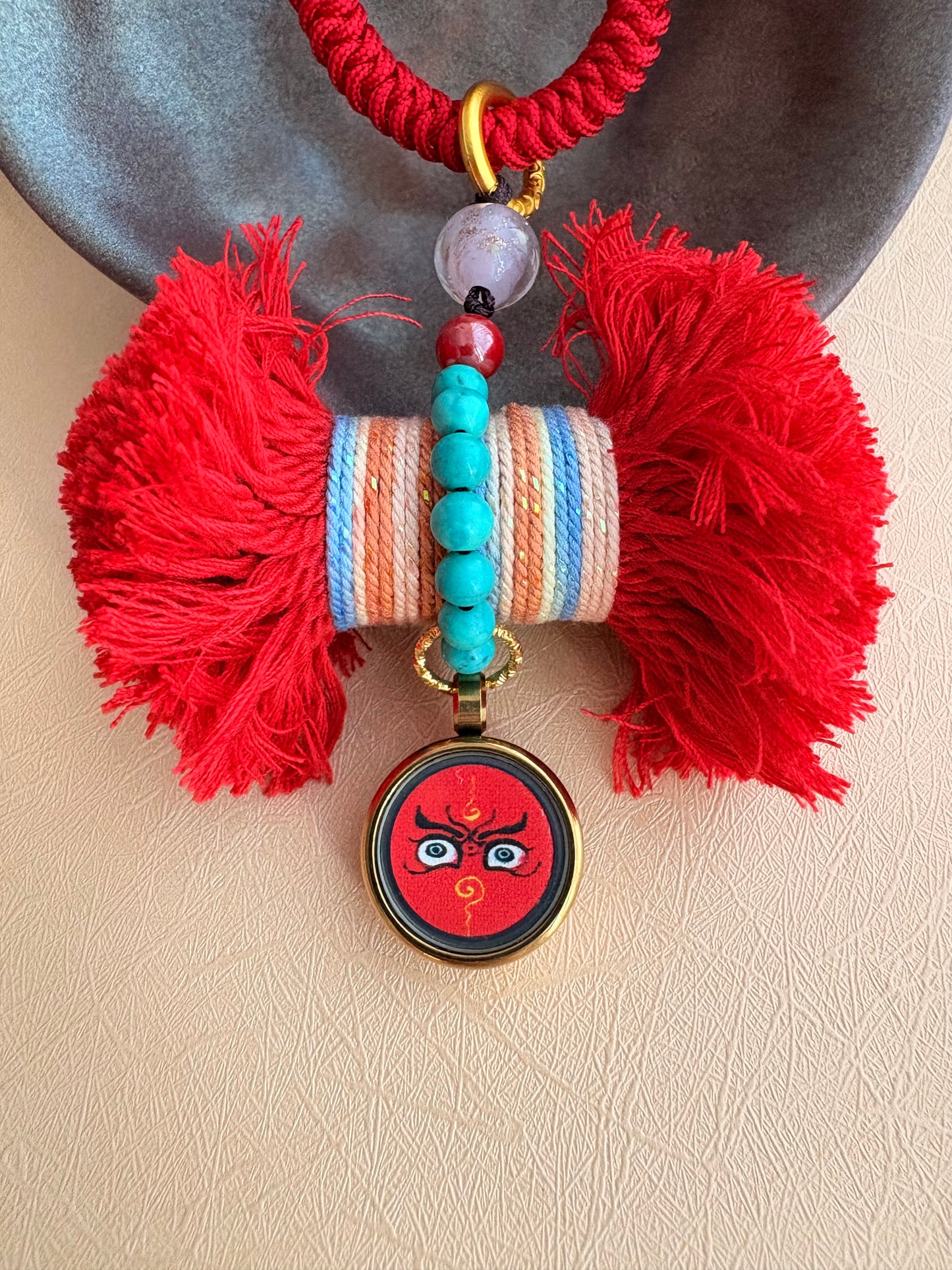 Damaru Charm with Red Jambhala in Tibetan Red