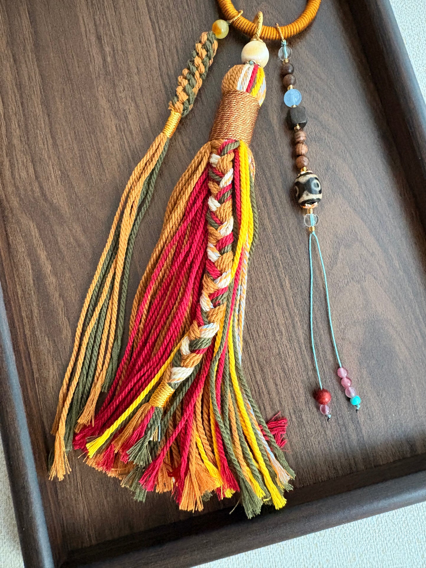 Mahakala Thangka Charm with Three-Eyed Agate Dzi Bead Tassel in Tibetan Brown