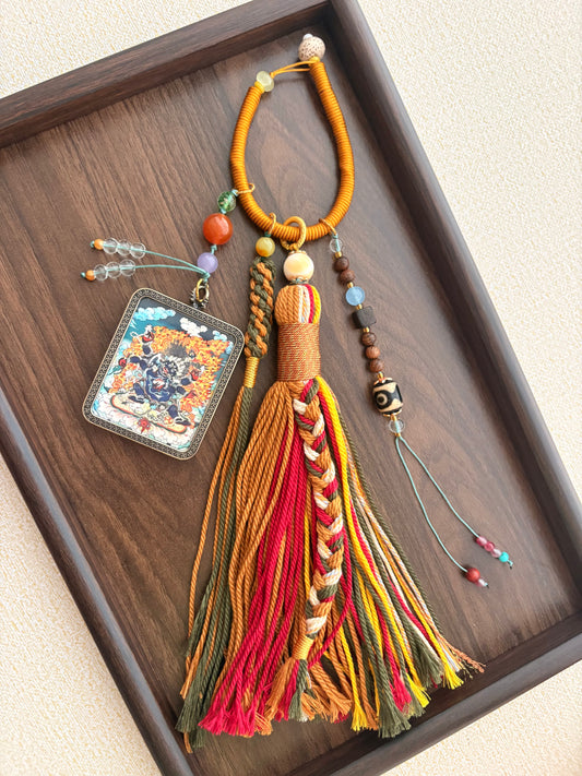 Mahakala Thangka Charm with Three-Eyed Agate Dzi Bead Tassel in Tibetan Brown