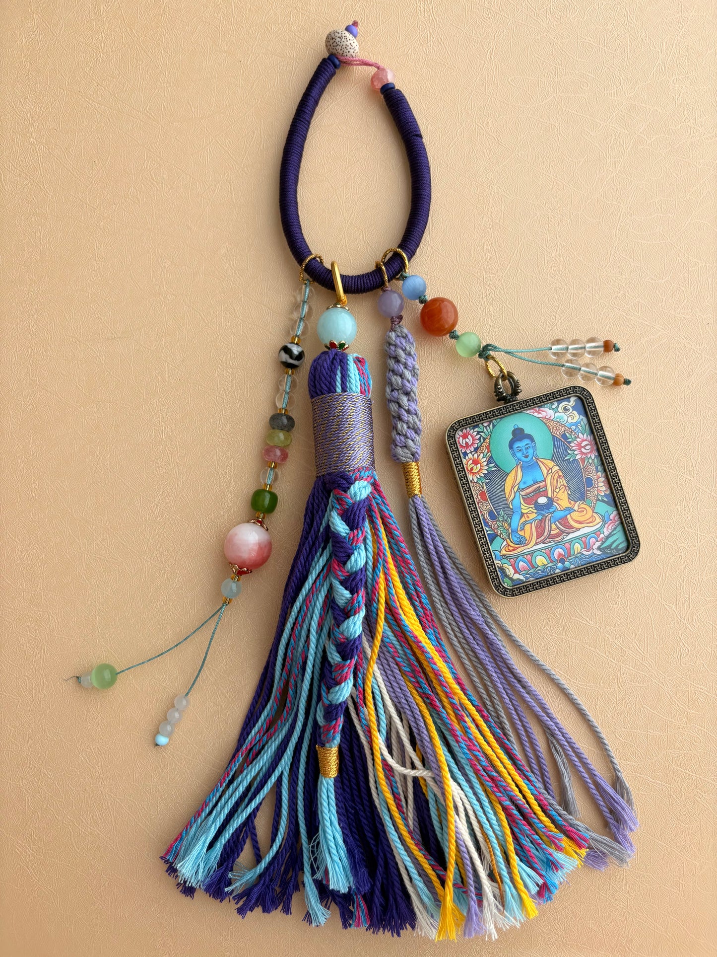Medicine Buddha Thangka Charm with Tiger Tooth Agate Dzi Bead Tassel in Tibetan Purple