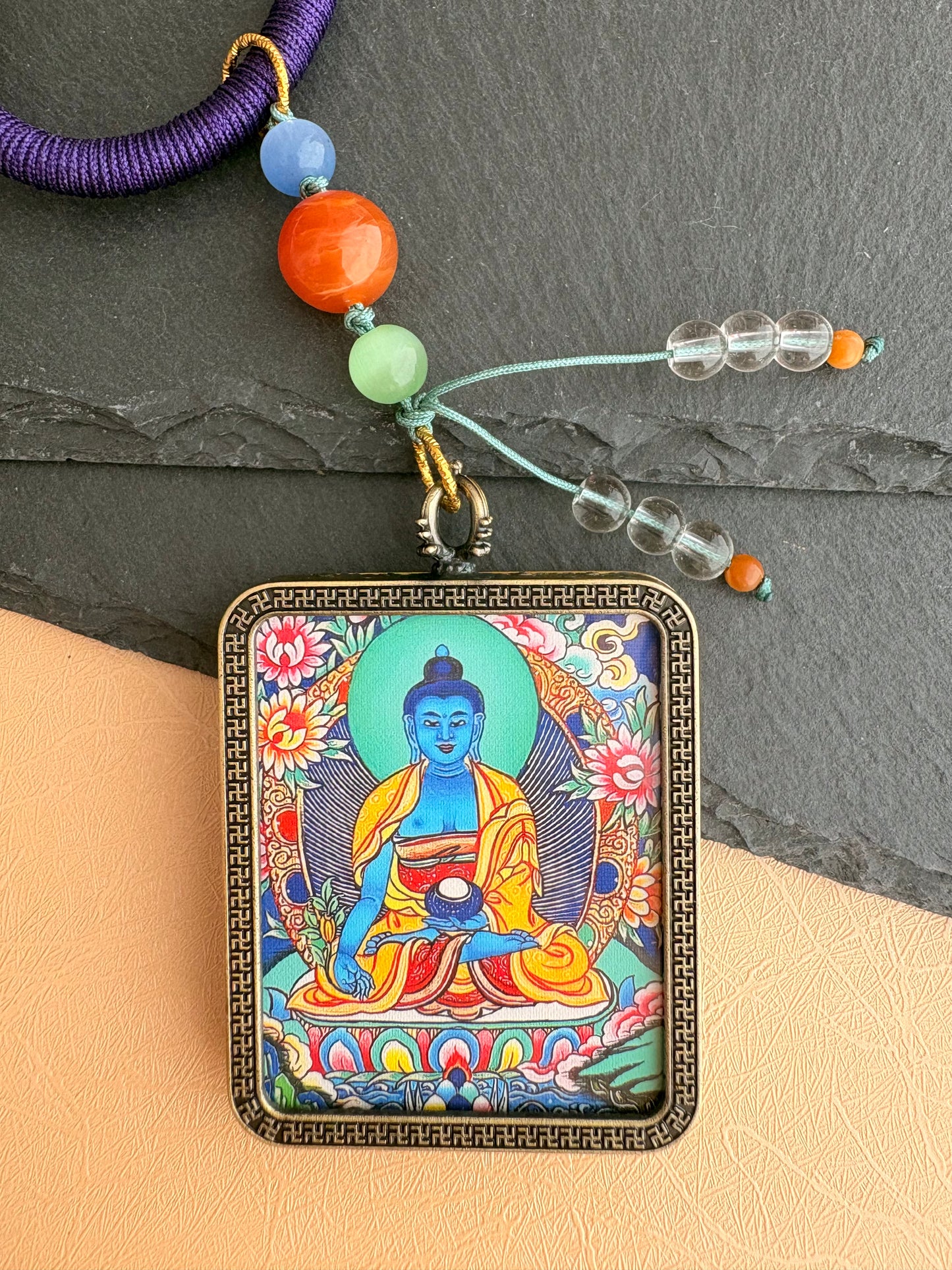 Medicine Buddha Thangka Charm with Tiger Tooth Agate Dzi Bead Tassel in Tibetan Purple