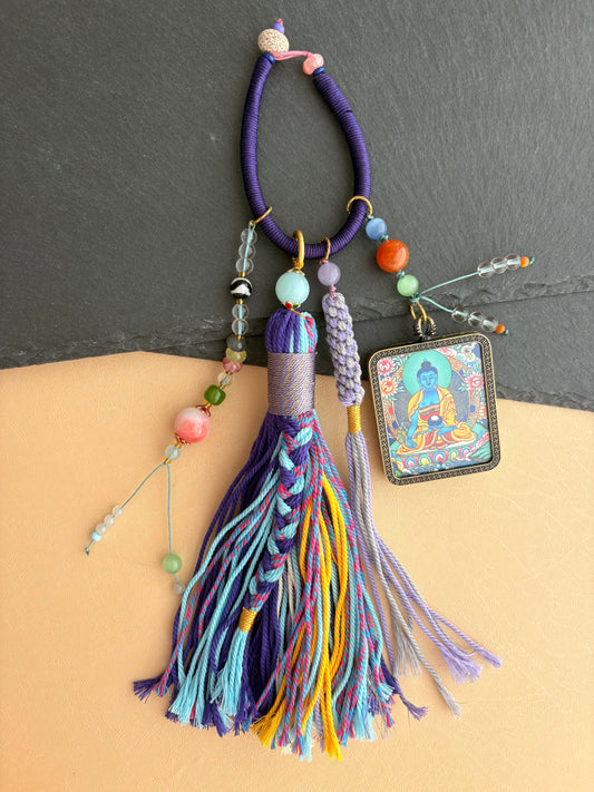 Medicine Buddha Thangka Charm with Tiger Tooth Agate Dzi Bead Tassel in Tibetan Purple