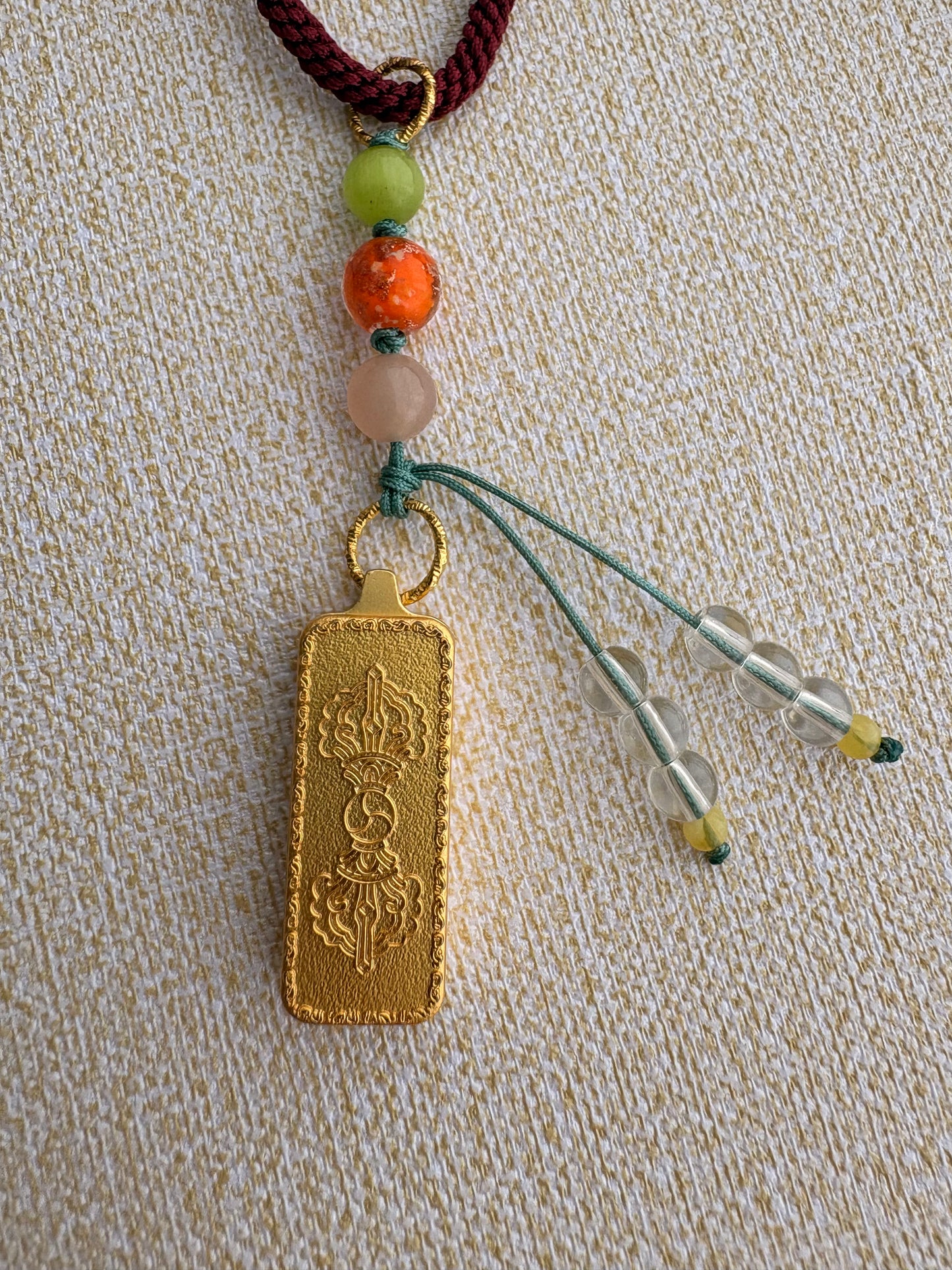 Small Mahakala Thangka Charm with Prayer Wheel Tassel in Tibetan Purple