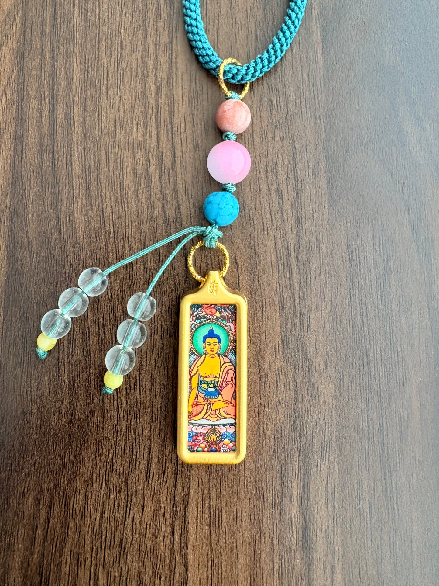 Small Sakyamuni Buddha Thangka Charm with Prayer Wheel Charm in Tibetan Purple