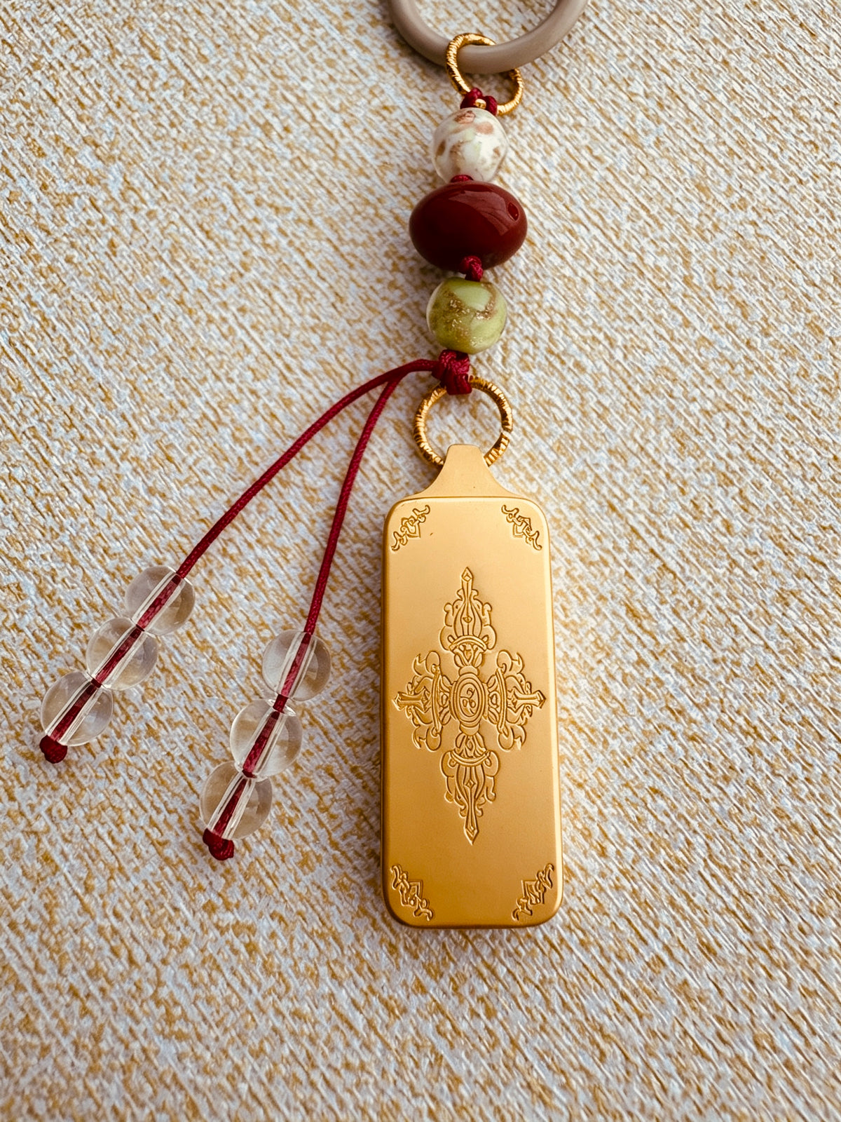 Small Victory Banner Charm with Medicine Buddha Thangka Tassel in Tibetan Red