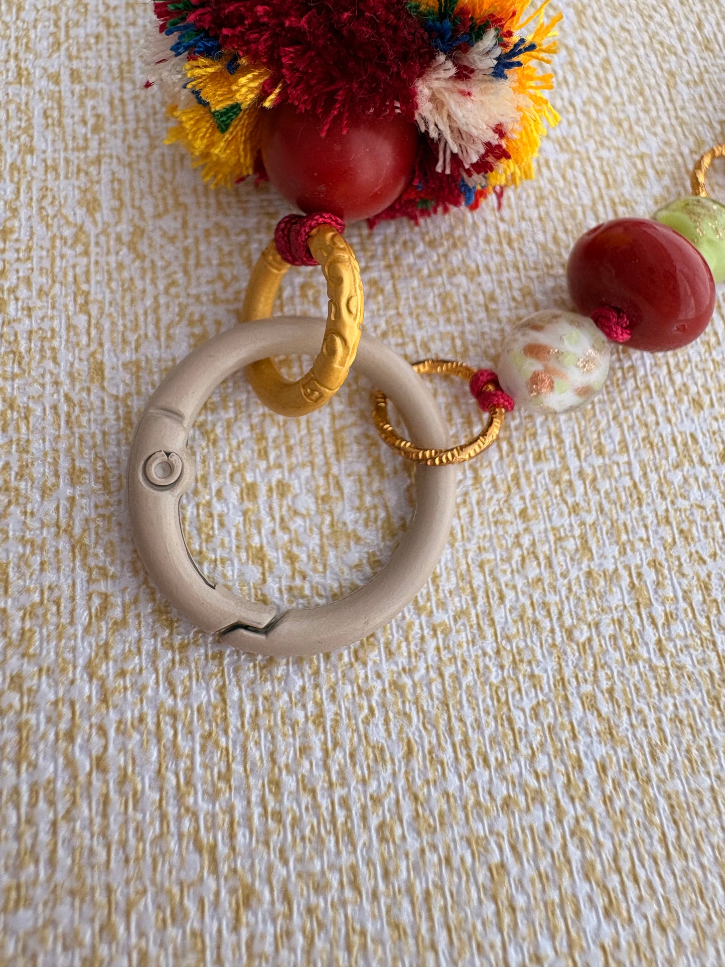 Small Victory Banner Charm with Medicine Buddha Thangka Tassel in Tibetan Red