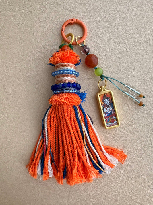 Small Victory Banner Charm with White Tara Thangka Tassel in Tibetan Orange