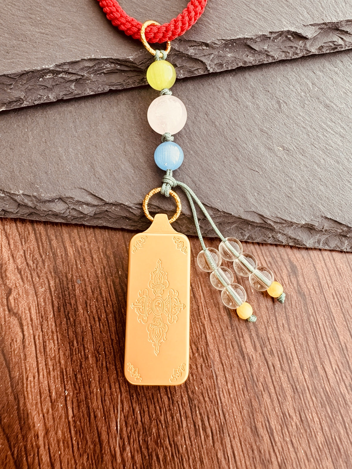 Small Yellow Jambhala Thangka Charm with Prayer Wheel Charm in Tibetan Red and Brown
