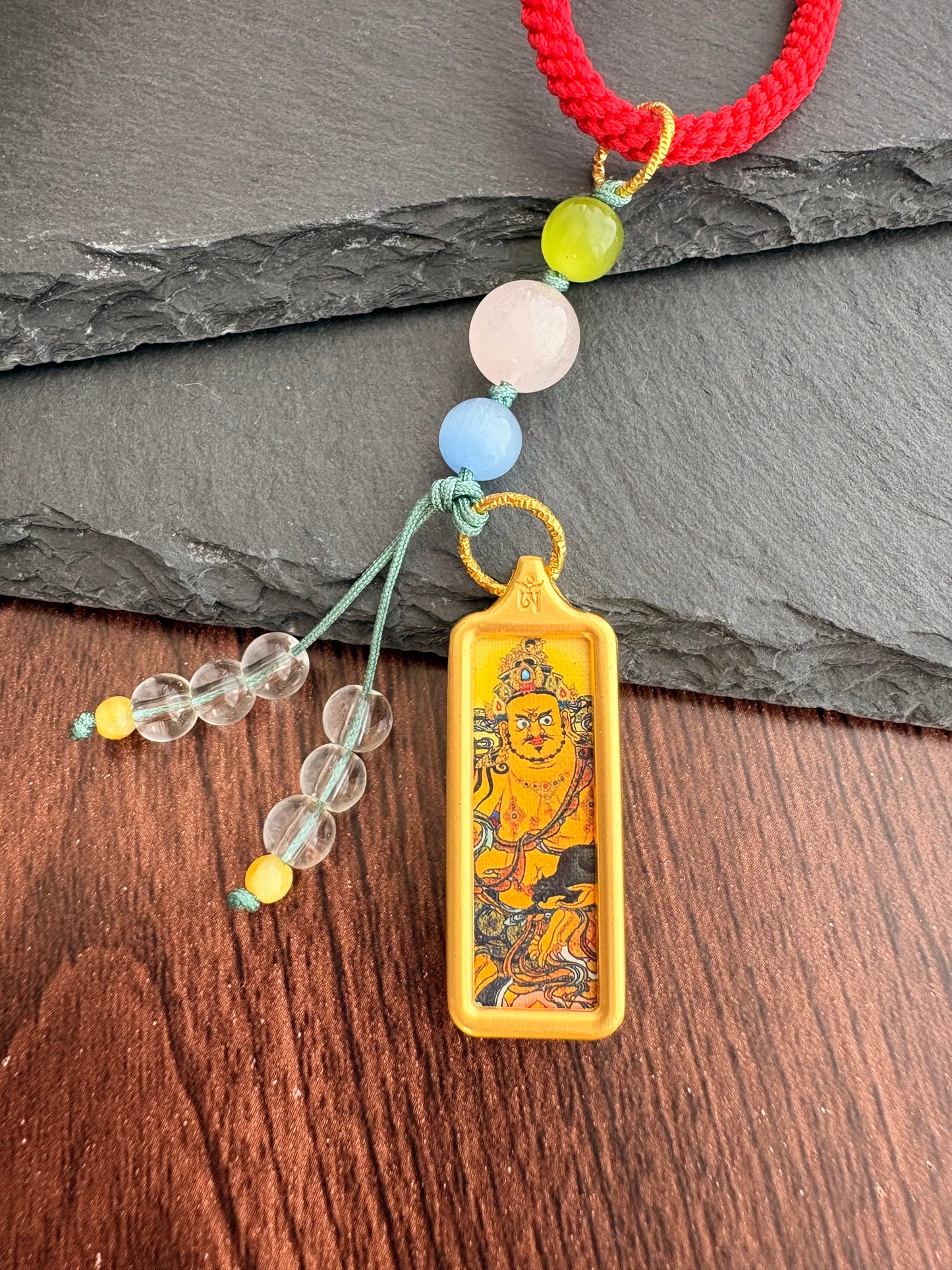 Small Yellow Jambhala Thangka Charm with Prayer Wheel Charm in Tibetan Red and Brown