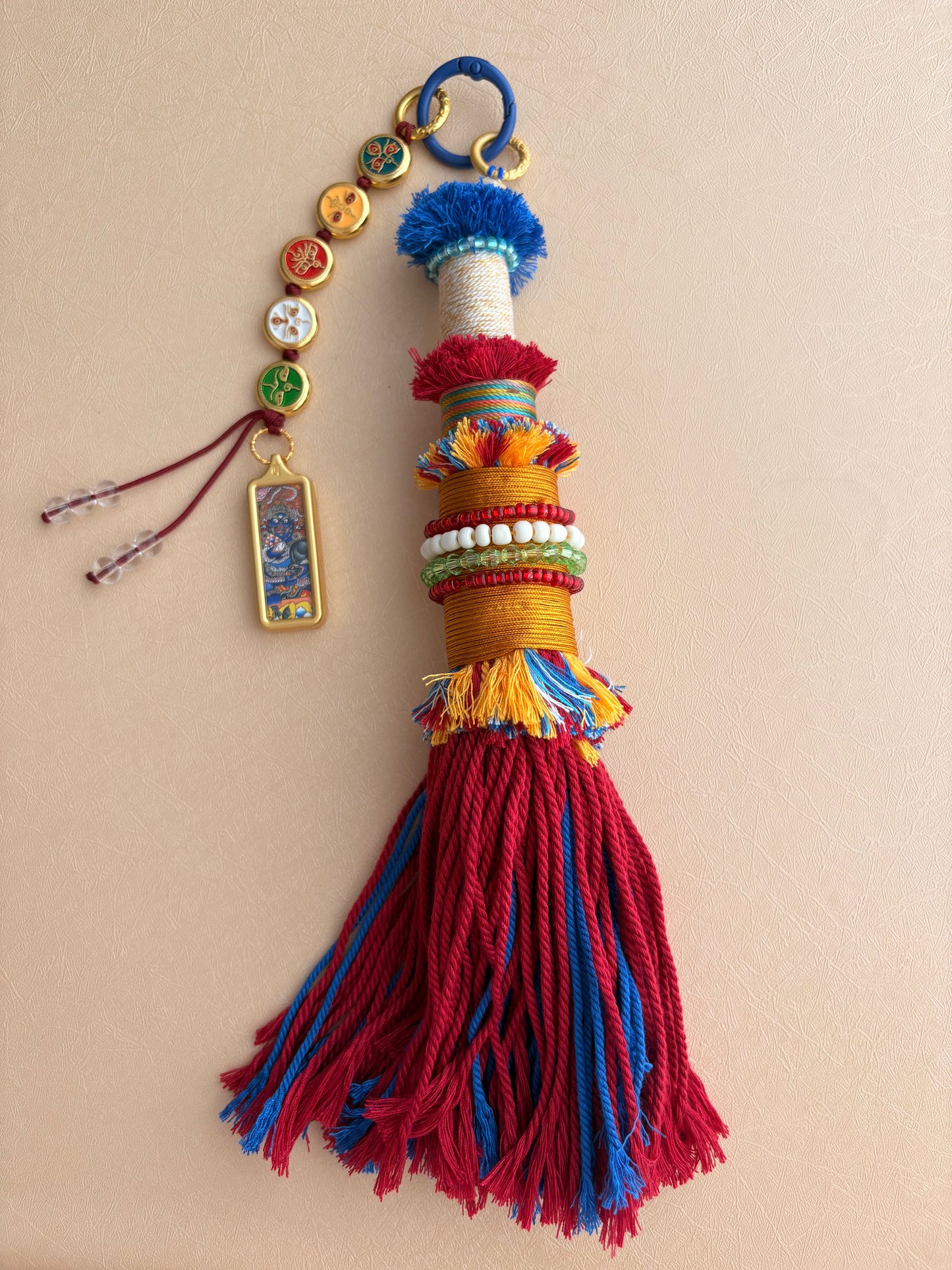 Victory Banner Charm with Black Jambhala Thangka Tassel in Tibetan Red and Blue