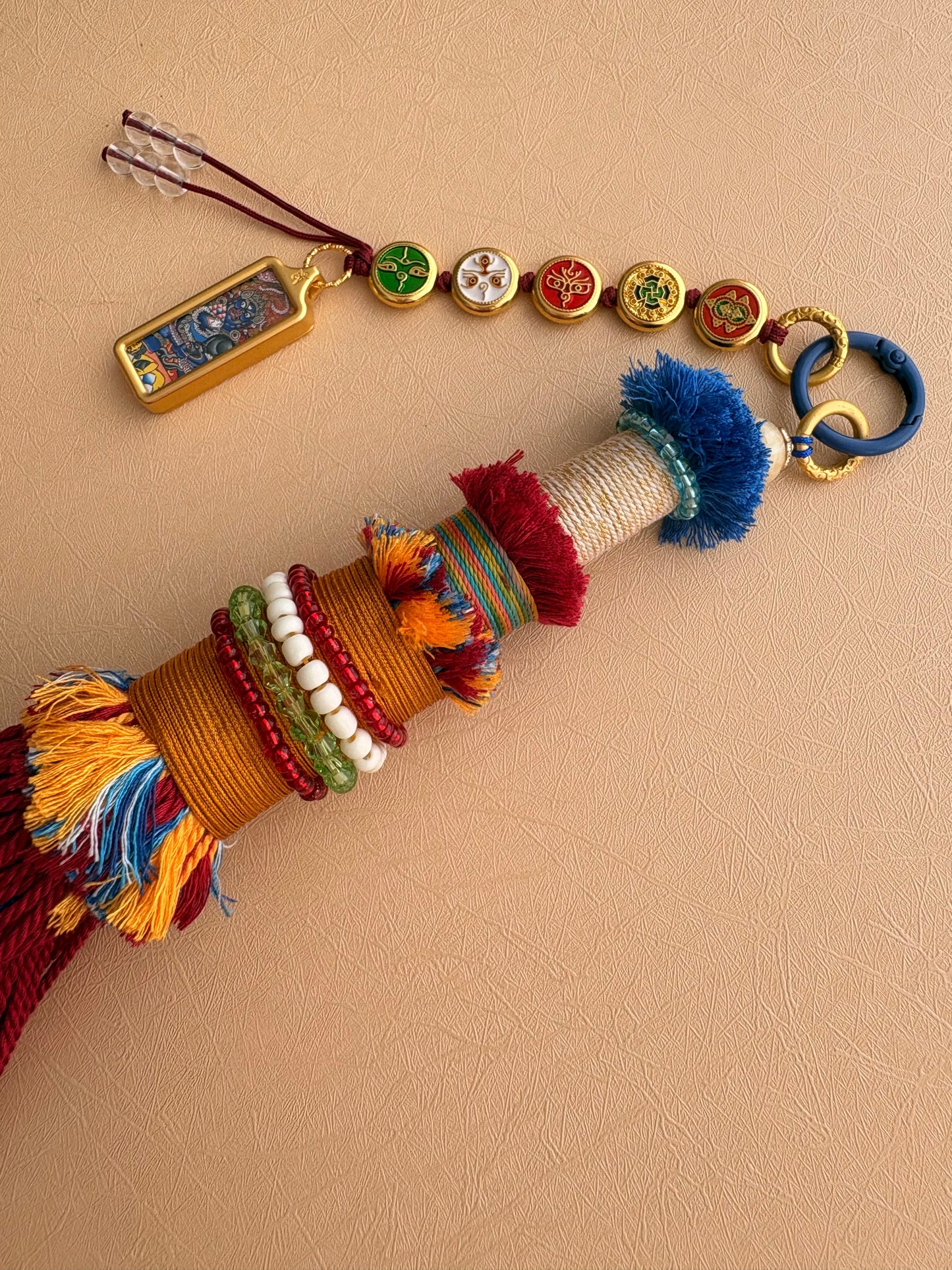 Victory Banner Charm with Black Jambhala Thangka Tassel in Tibetan Red and Blue