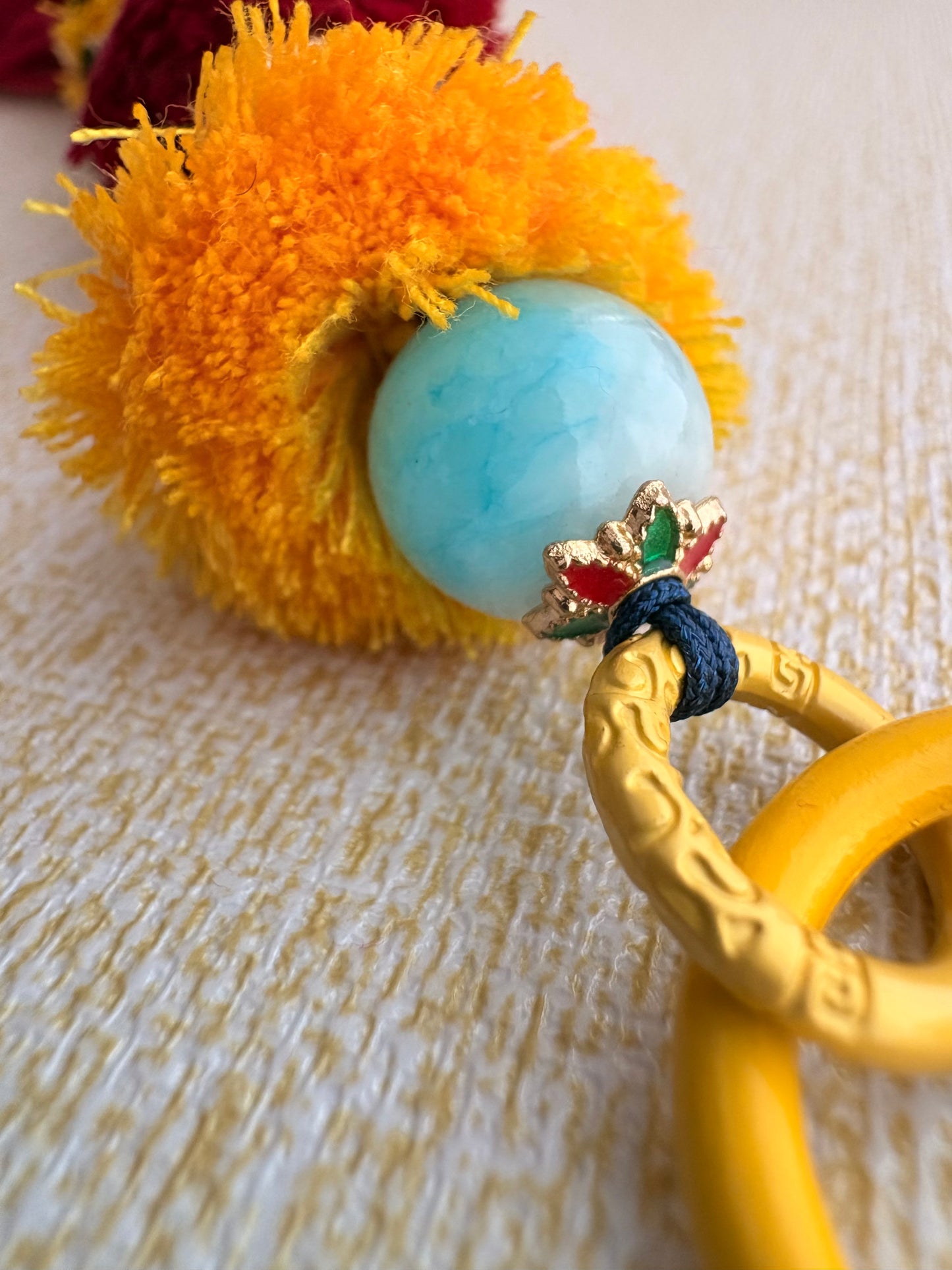 Victory Banner Charm with Manjushri Bodhisattva Thangka Tassel in Tibetan Red and Yellow