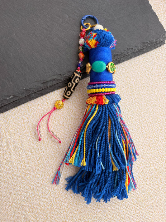Victory Banner Charm with Nine-Eyed Dzi Bead Tassel in deep Tibetan Blue