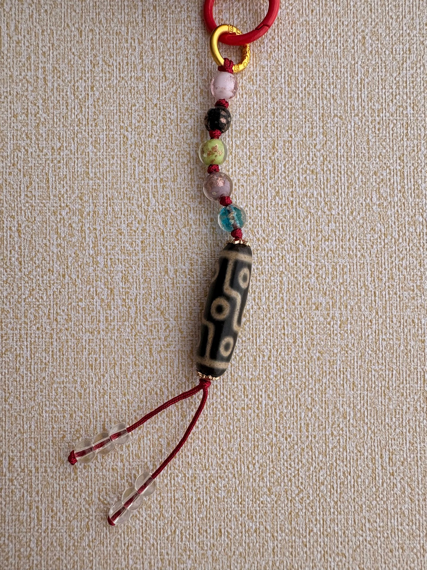 Victory Banner Charm with Nine-Eyed Dzi Bead Tassel in Tibetan Red and blue
