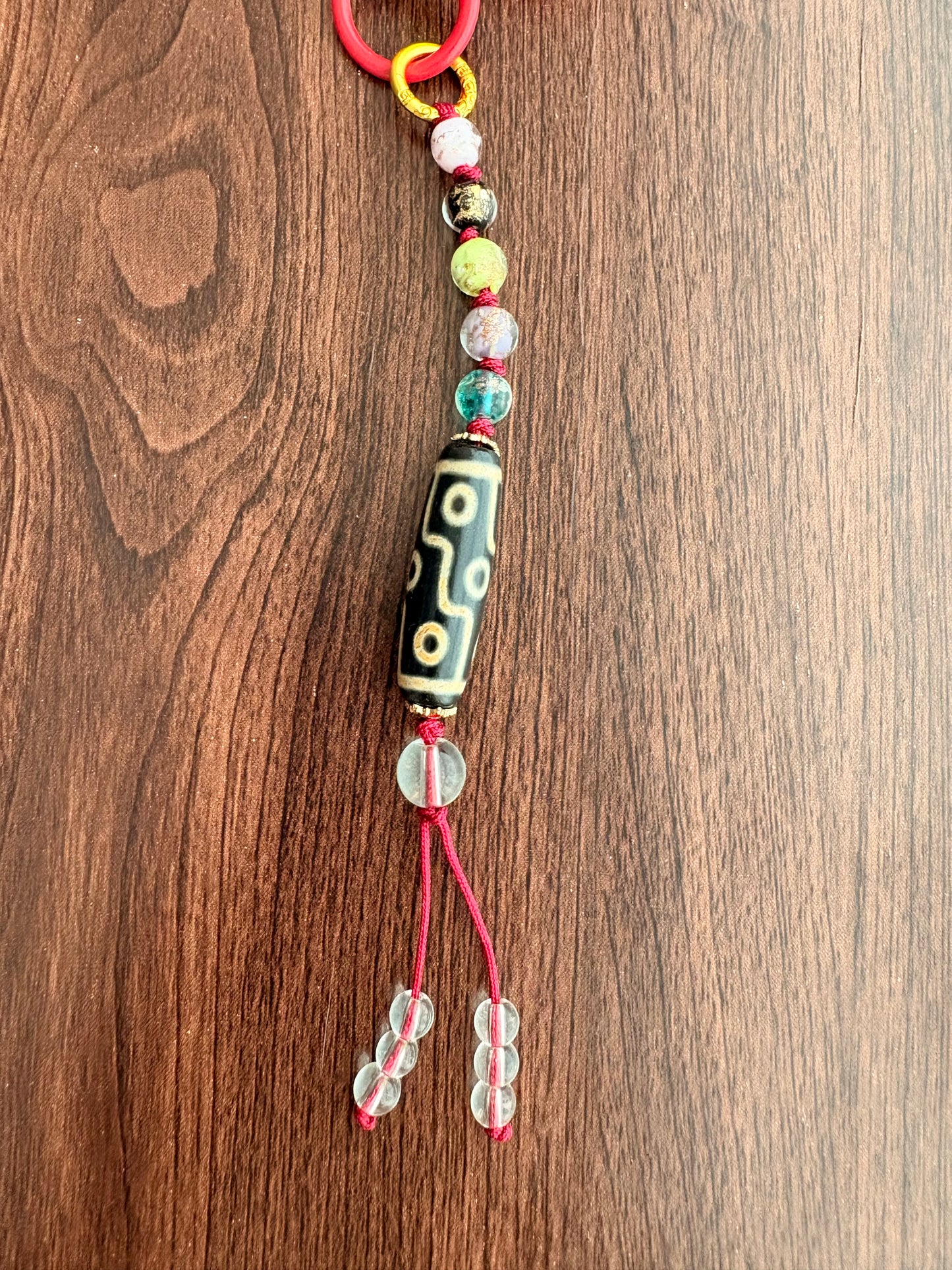 Victory Banner Charm with Nine-Eyed Dzi Bead Tassel in Tibetan Red