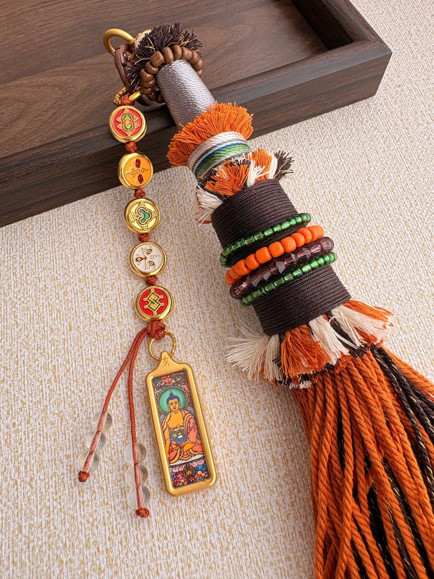 Victory Banner Charm with Sakyamuni Buddha Thangka Tassel in Tibetan Brown