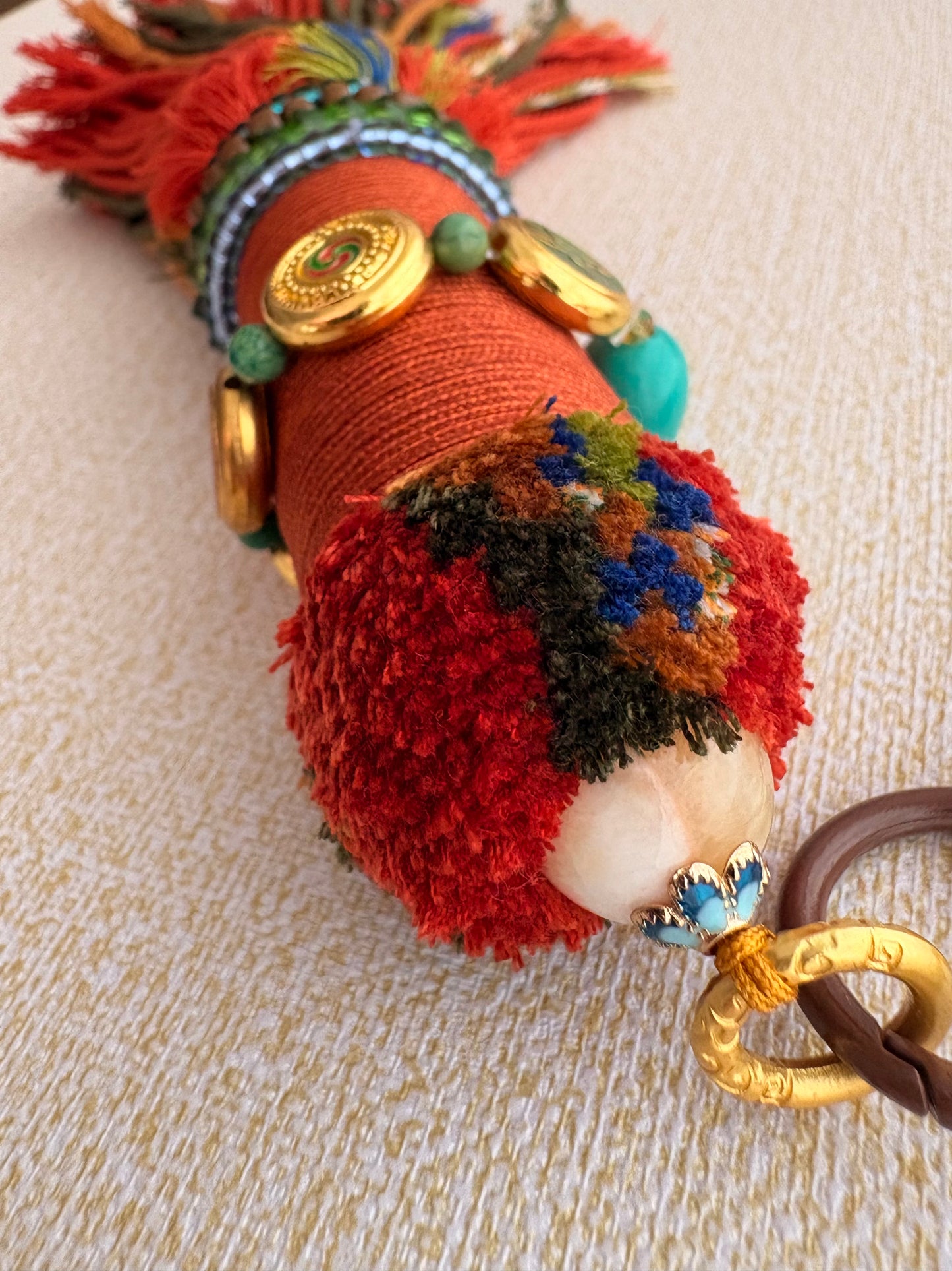 Victory Banner Charm with Three-Eyed Dzi Bead Tassel in Tibetan Orange