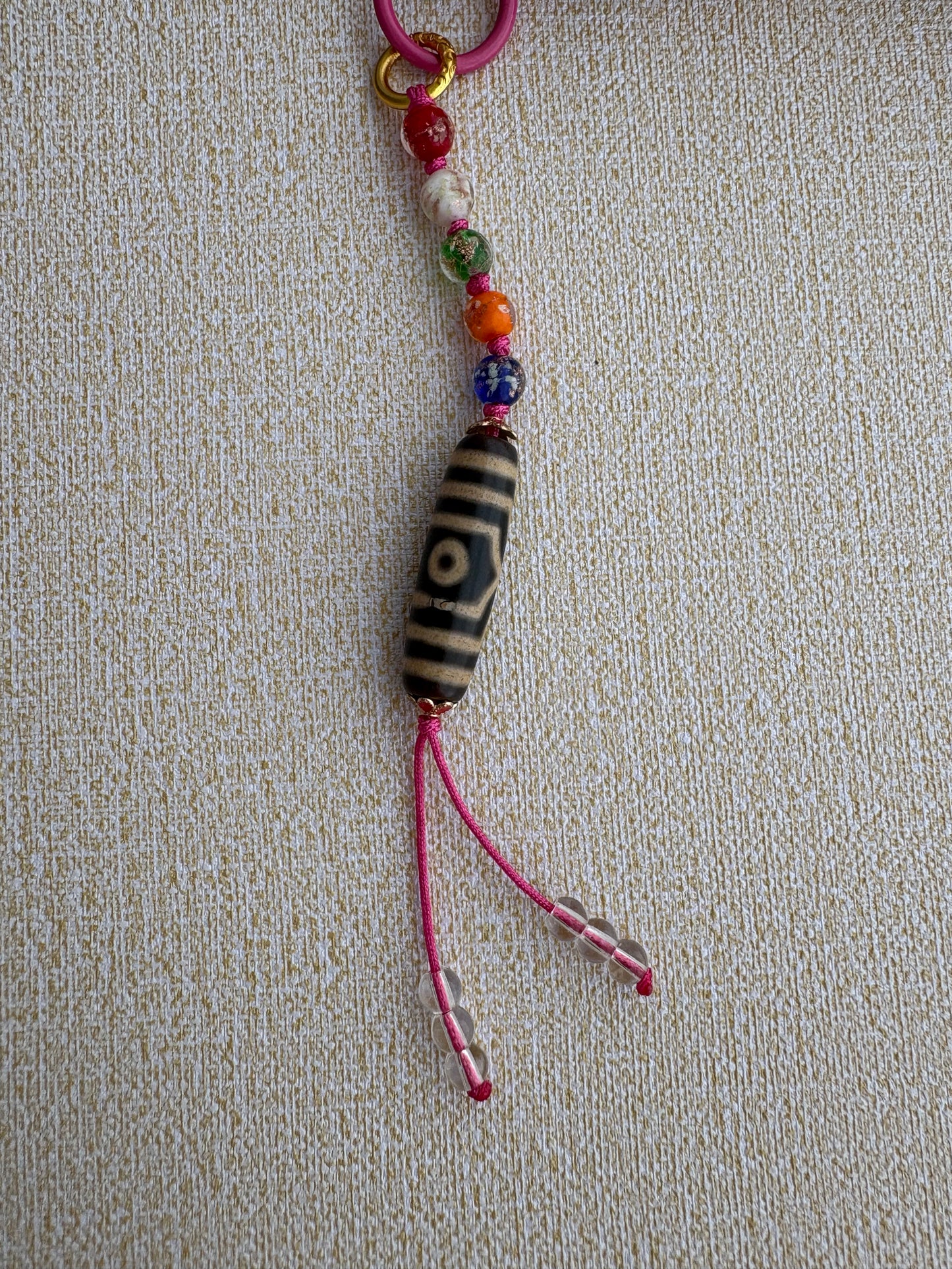 Victory Banner Charm with Three-Eyed Dzi Bead Tassel in Tibetan Pink