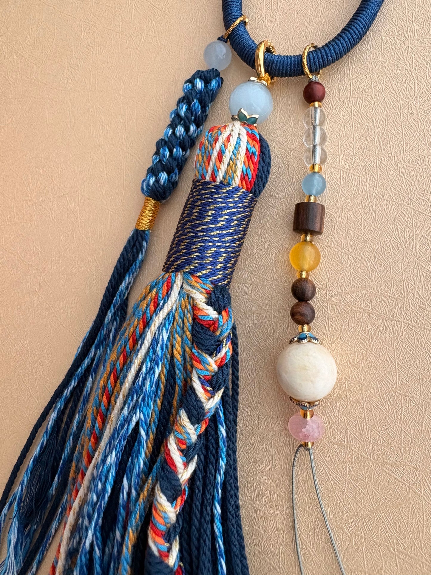 Yellow Jambhala Thangka Charm with Jade Tassel in Deep Tibetan Blue