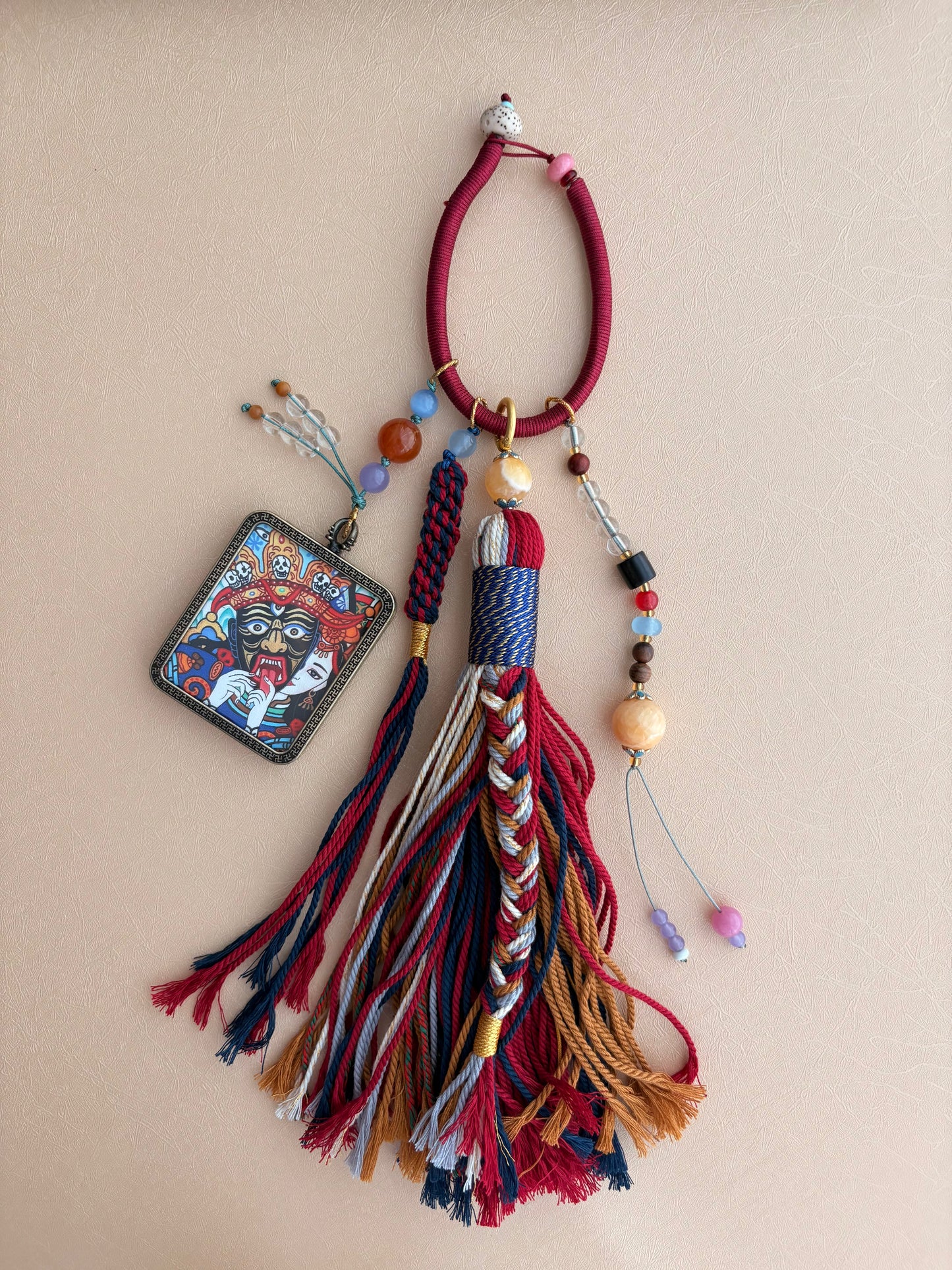 Zaki Lhamo Thangka Charm with Jade Tassel in Tibetan Red