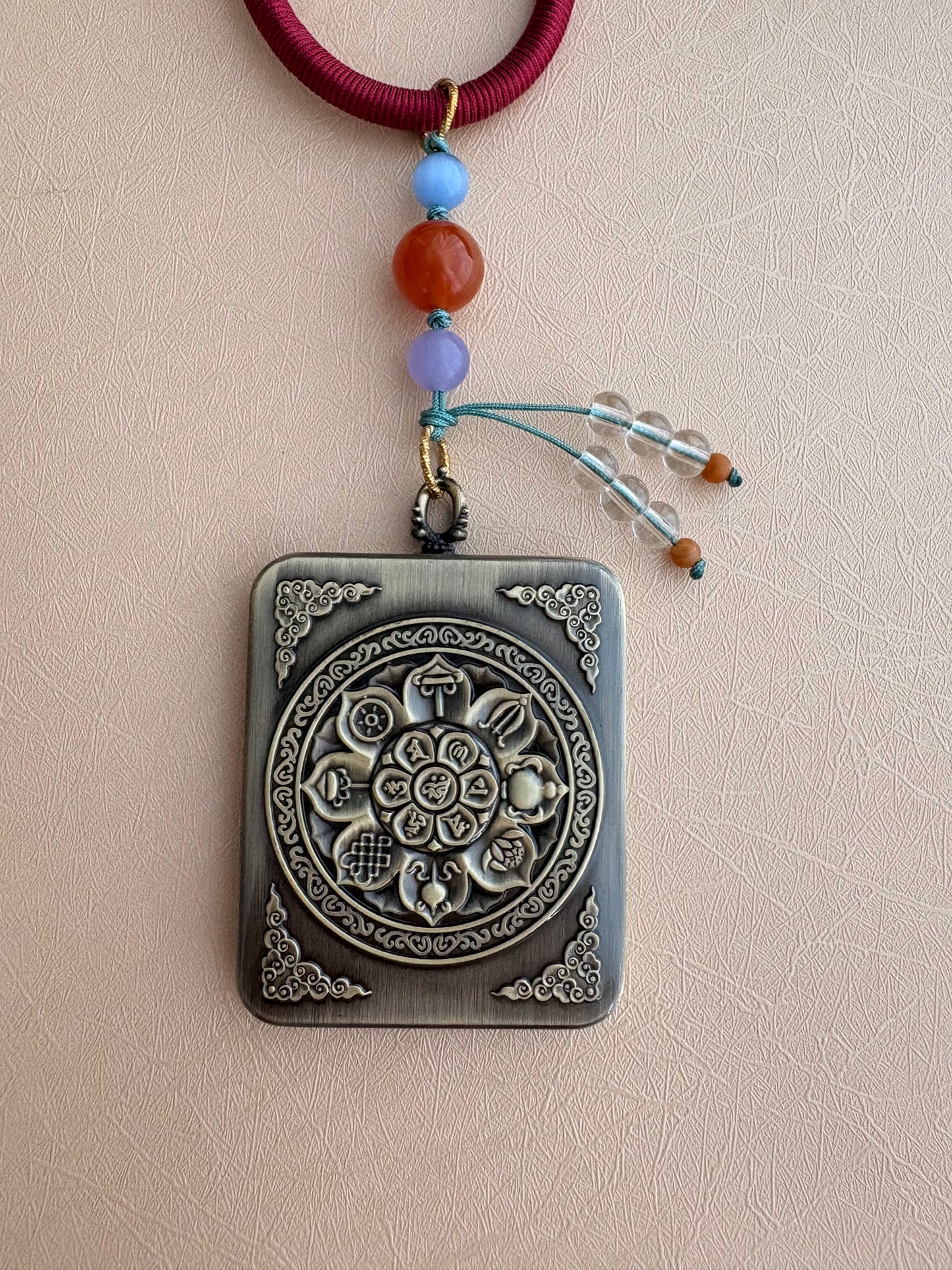 Zaki Lhamo Thangka Charm with Jade Tassel in Tibetan Red