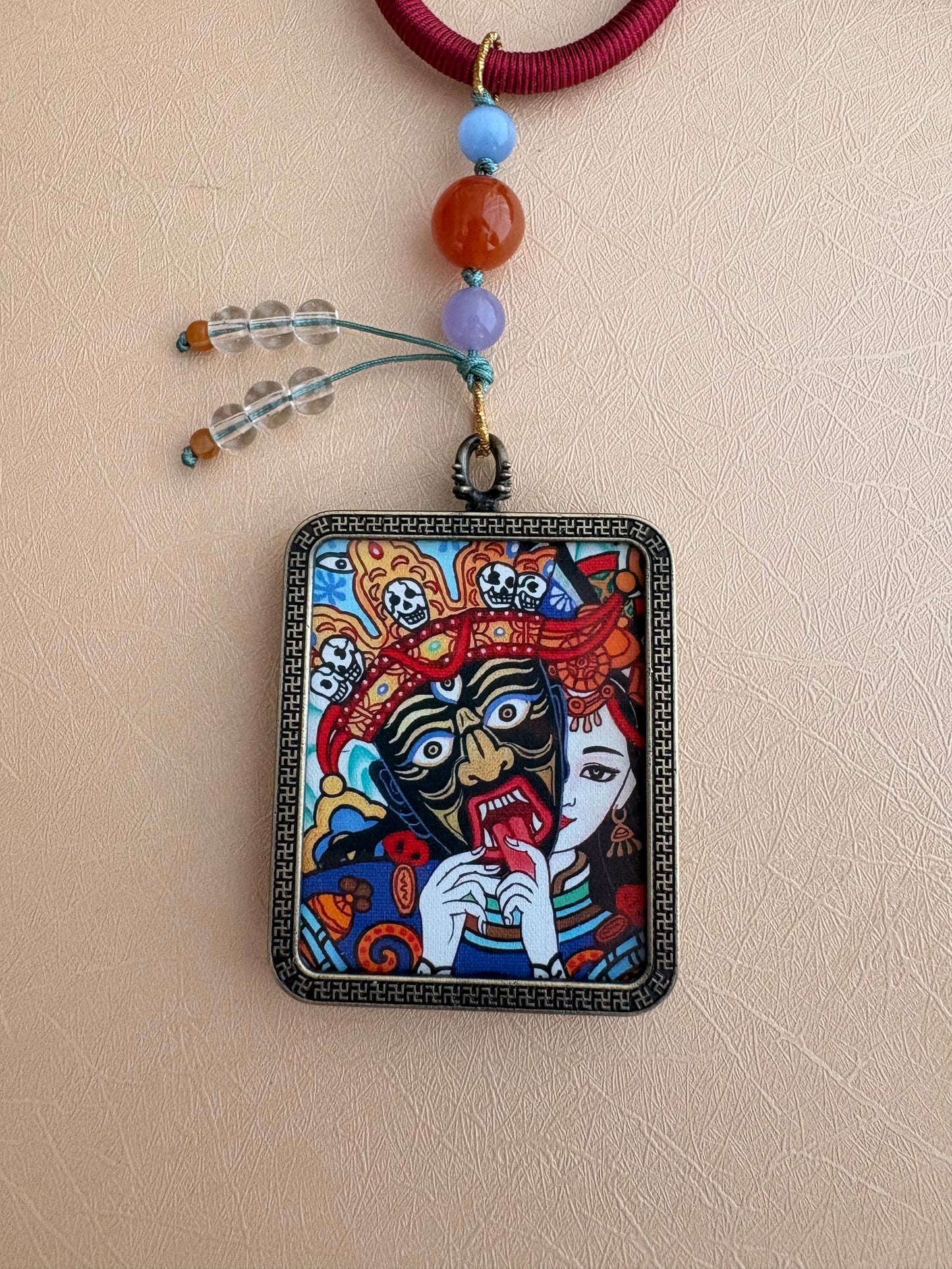 Zaki Lhamo Thangka Charm with Jade Tassel in Tibetan Red