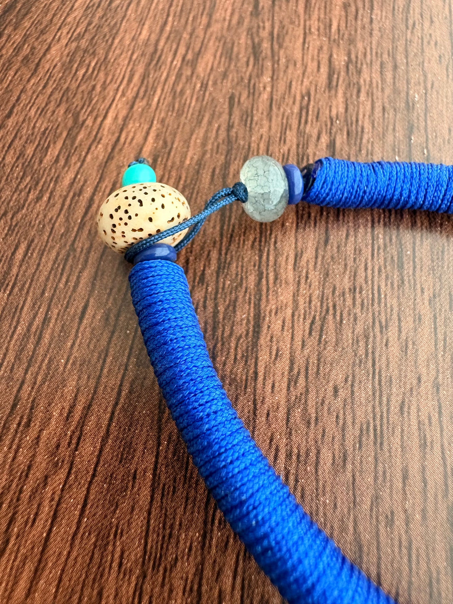 Zaki Lhamo Thangka Charm with Three-Eyed Dzi Bead Tassel in Deep Tibetan Blue