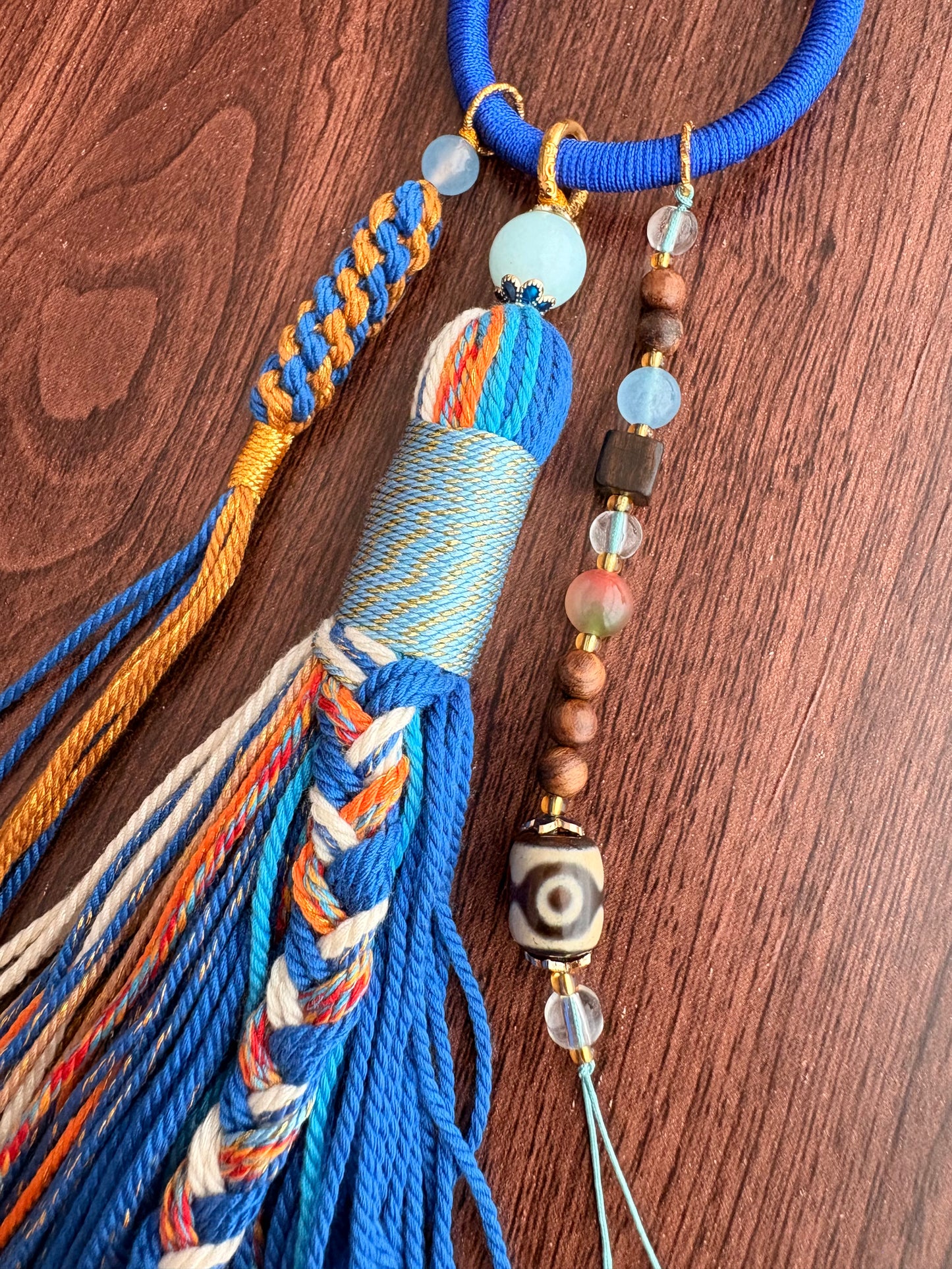 Zaki Lhamo Thangka Charm with Three-Eyed Dzi Bead Tassel in Deep Tibetan Blue