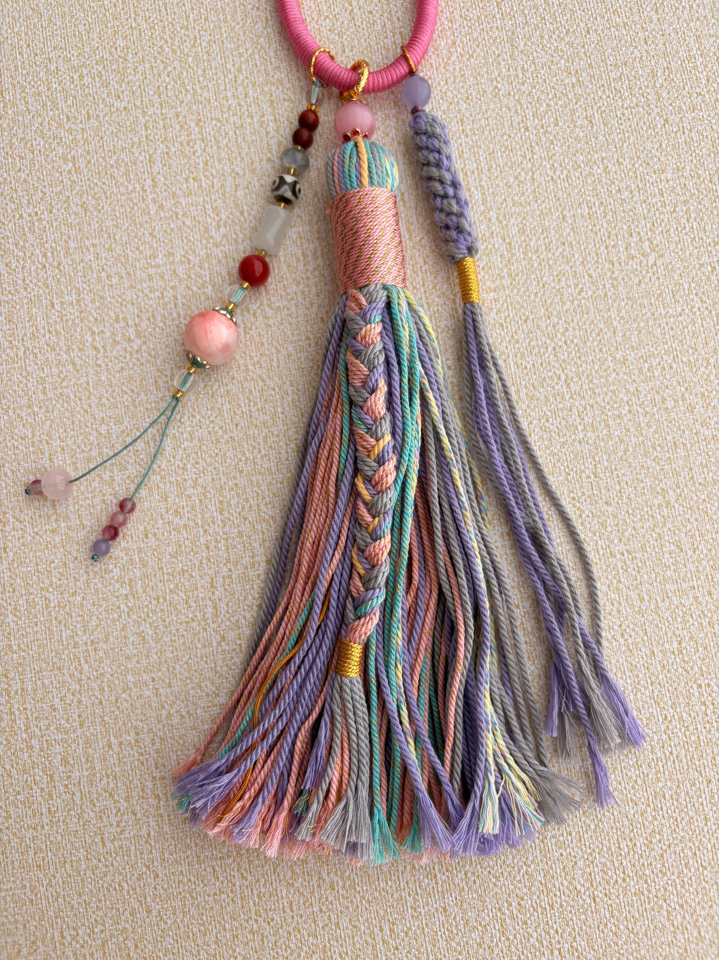 Zaki Lhamo Thangka Charm with Three-Eyed Dzi Bead Tassel in Tibetan Pink